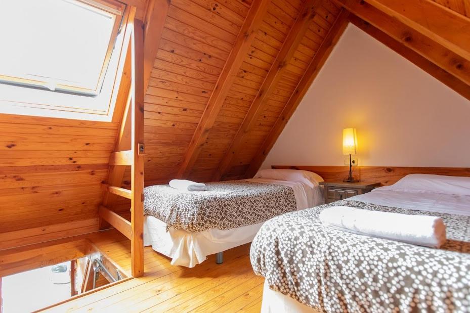 Postel nebo postele na pokoji v ubytování Petit Verneda