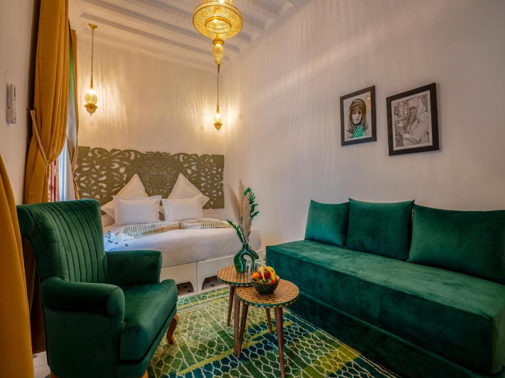 Postel nebo postele na pokoji v ubytování Dar Al-Famila Hamam & Spa