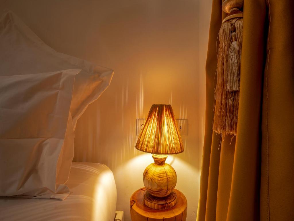Postel nebo postele na pokoji v ubytování Dar Al-Famila Hamam & Spa