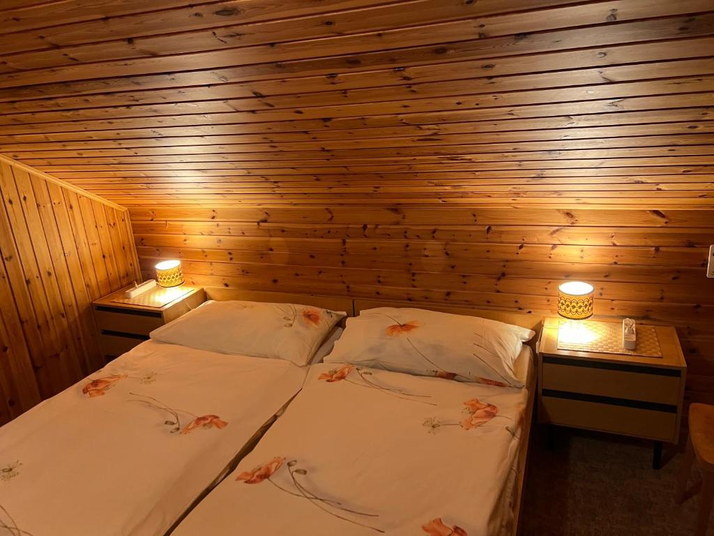 Letto o letti in una camera di Zimmervermietung Ackersand