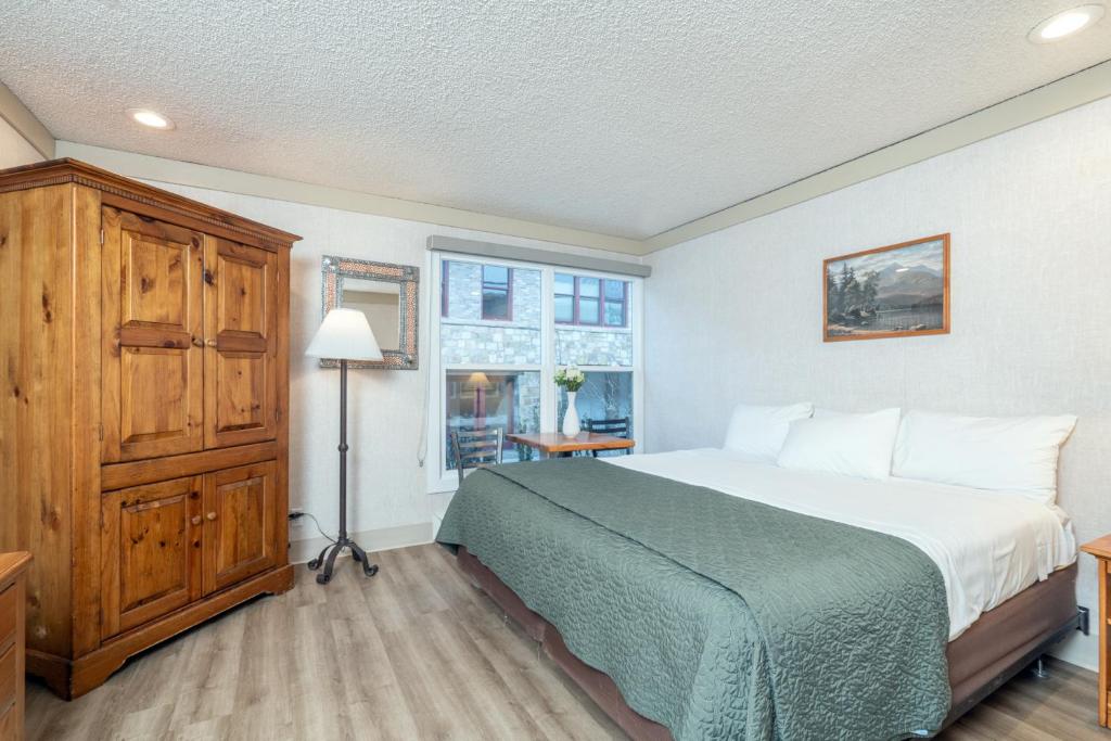 Ένα ή περισσότερα κρεβάτια σε δωμάτιο στο Mountainside Inn 311 by Alpine Lodging Telluride