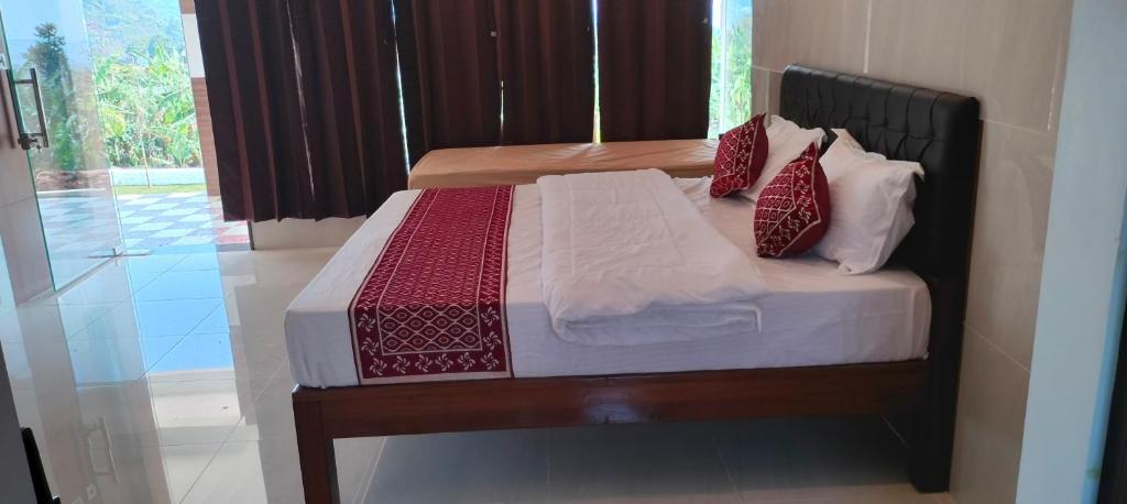Postel nebo postele na pokoji v ubytování Chill Breeze Paradise