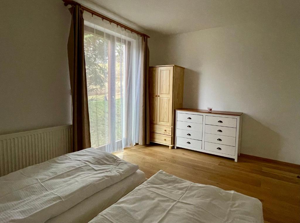 Postel nebo postele na pokoji v ubytování Chata Smrčka