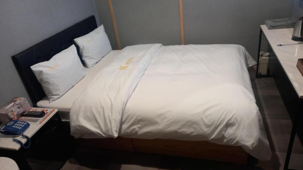 Katil atau katil-katil dalam bilik di Mong Motel