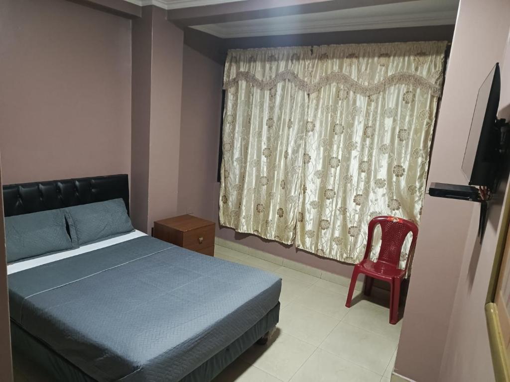 Postel nebo postele na pokoji v ubytování Hotel Caribe