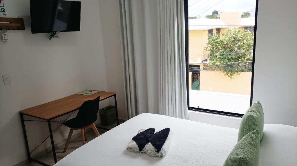 Letto o letti in una camera di Tauch Cancún Centro