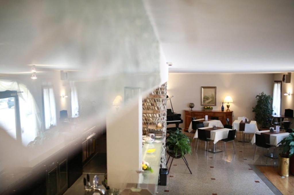 Posezení v ubytování Hotel Al Posta