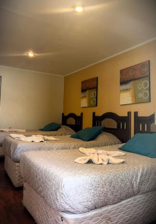 Postel nebo postele na pokoji v ubytování Hostal Don Guillermo
