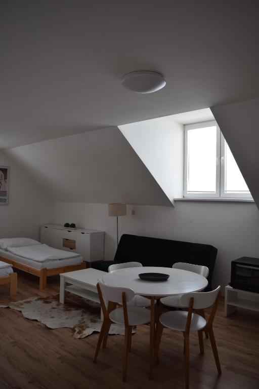 A bed or beds in a room at Penzión na Hranici Čirč
