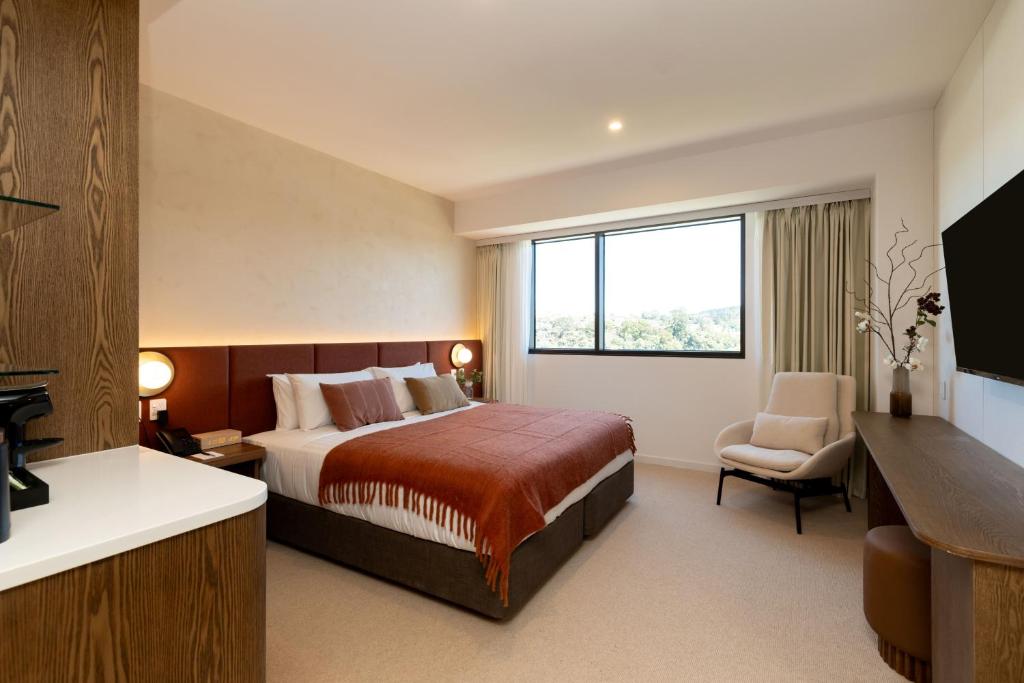 Postel nebo postele na pokoji v ubytování Maxim Hotel - Auckland