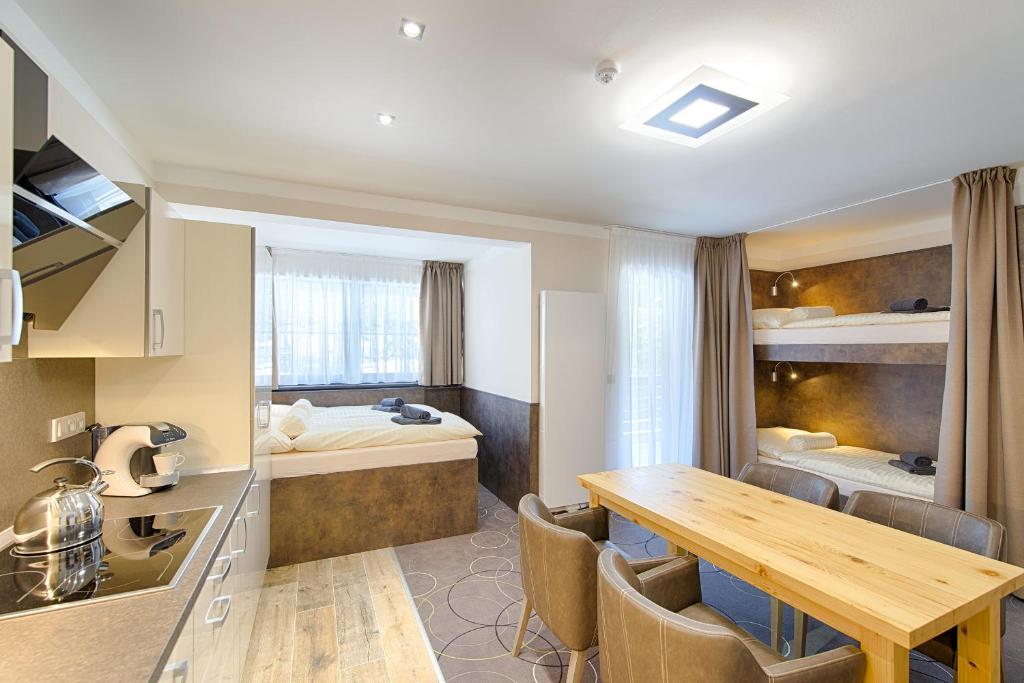 Kuchyň nebo kuchyňský kout v ubytování Apartment Hotel Orion