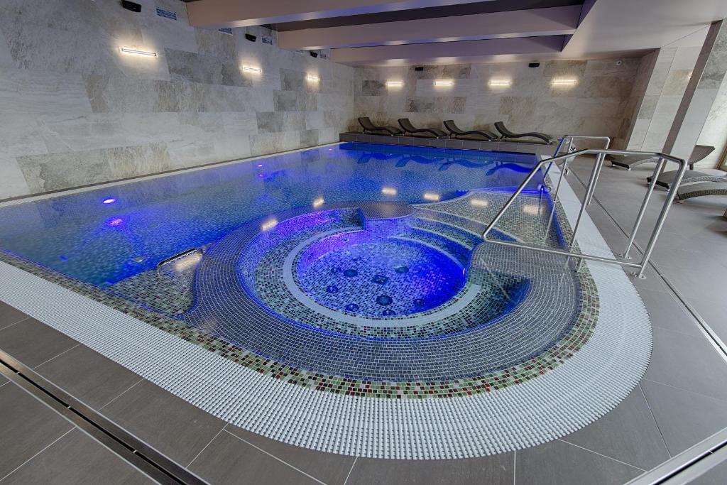 Bazén v ubytování Apartment Hotel Orion nebo v jeho okolí