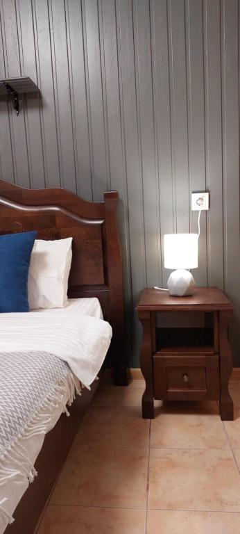 Postel nebo postele na pokoji v ubytování Olimpia Hotel&Spa