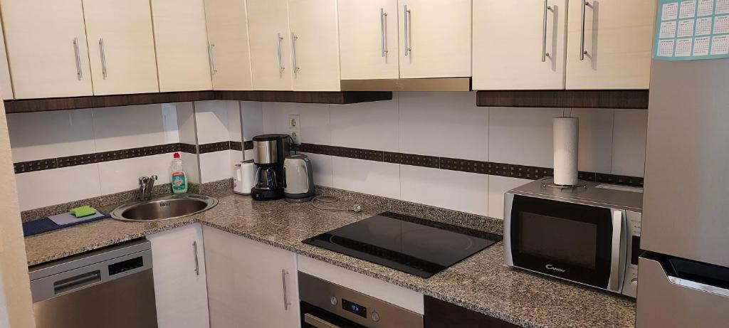 Kuchyň nebo kuchyňský kout v ubytování Apartamento Antina 12 en Santa Pola