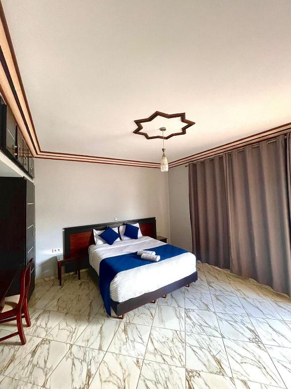 Postel nebo postele na pokoji v ubytování Maison d'hôtes familiale "Dar Aboulanwar"