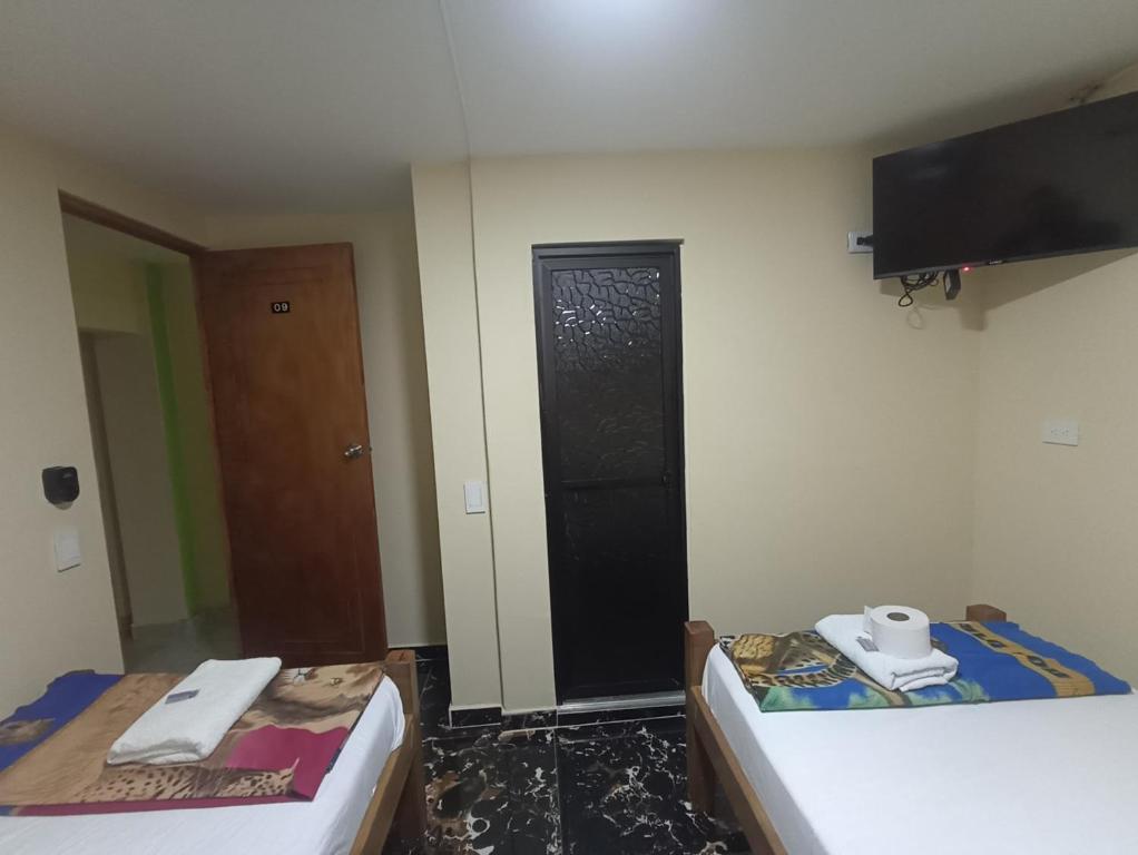 Postel nebo postele na pokoji v ubytování Hotel San Vicente