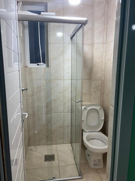 Ένα μπάνιο στο Apartamento 2 dormitório ótima localização