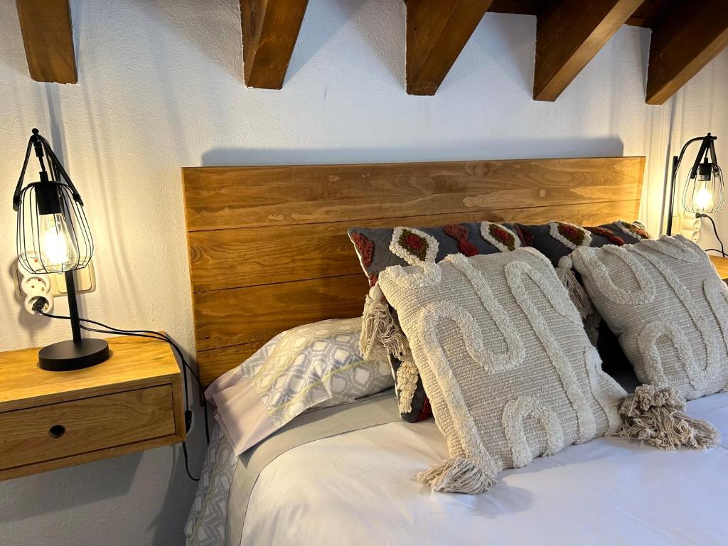 Postel nebo postele na pokoji v ubytování Apartament encantador, familiar i lluminós by RURAL D'ÀNEU