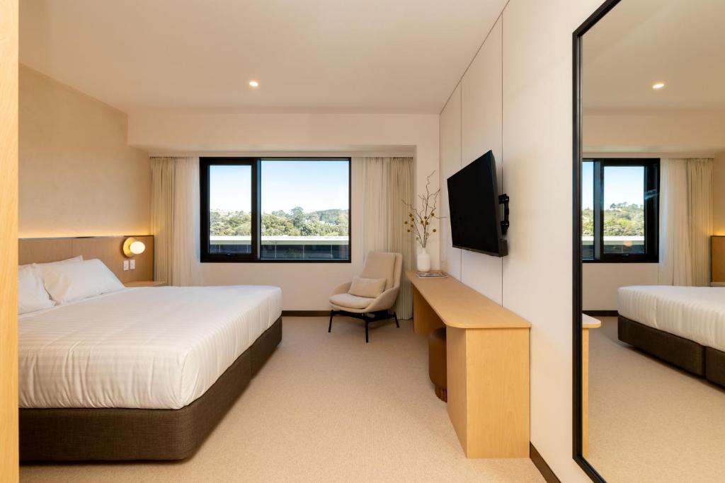 Postel nebo postele na pokoji v ubytování Maxim Hotel - Auckland
