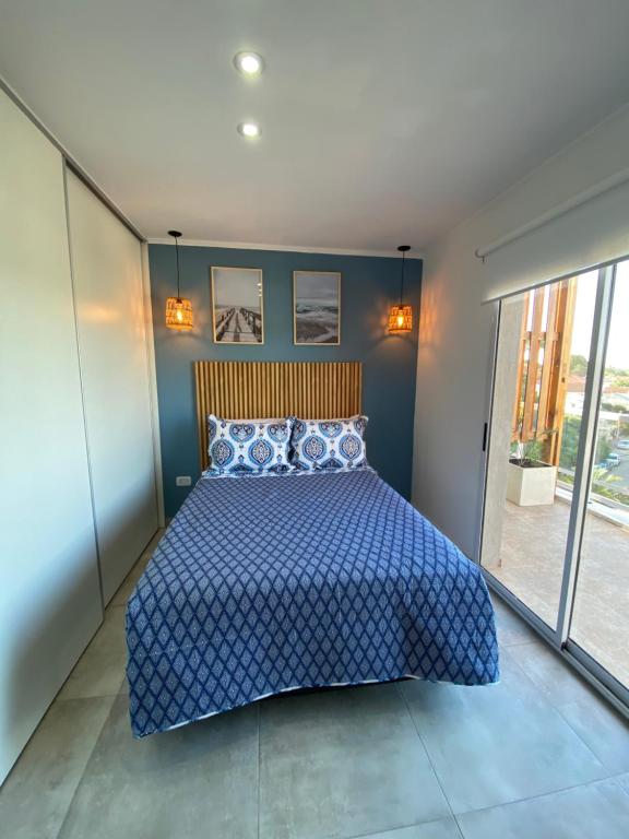 Postel nebo postele na pokoji v ubytování Departamento boutique del mar 2