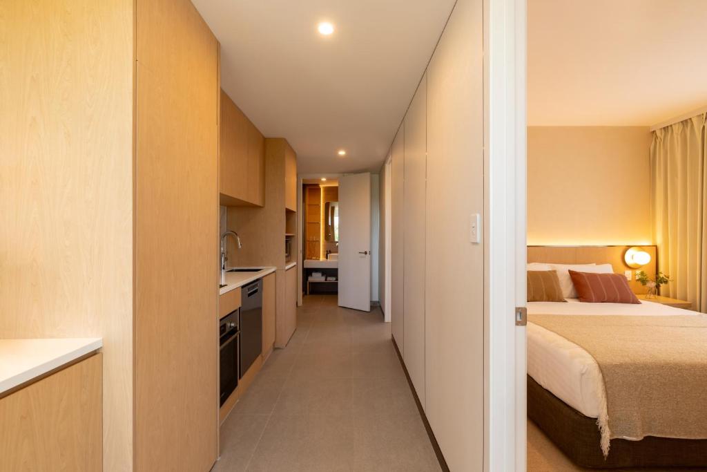 Postel nebo postele na pokoji v ubytování Maxim Hotel - Auckland
