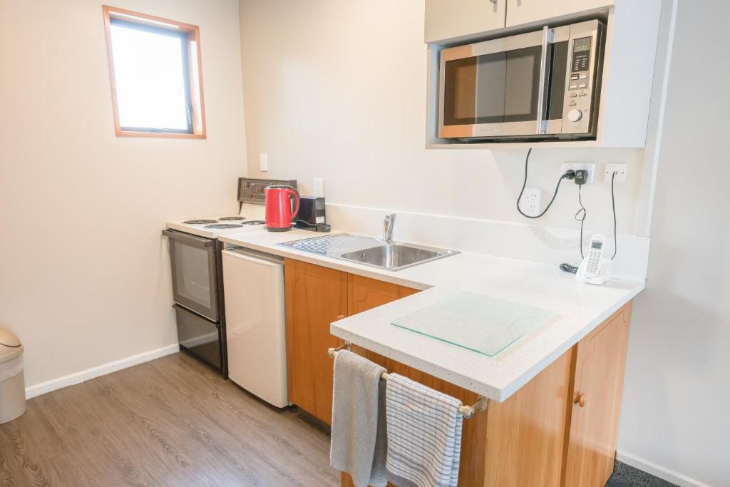 Kuchyň nebo kuchyňský kout v ubytování Strathern Motor Lodge