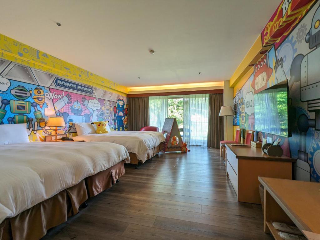 Una cama o camas en una habitación de Howard Beach Resort Kenting