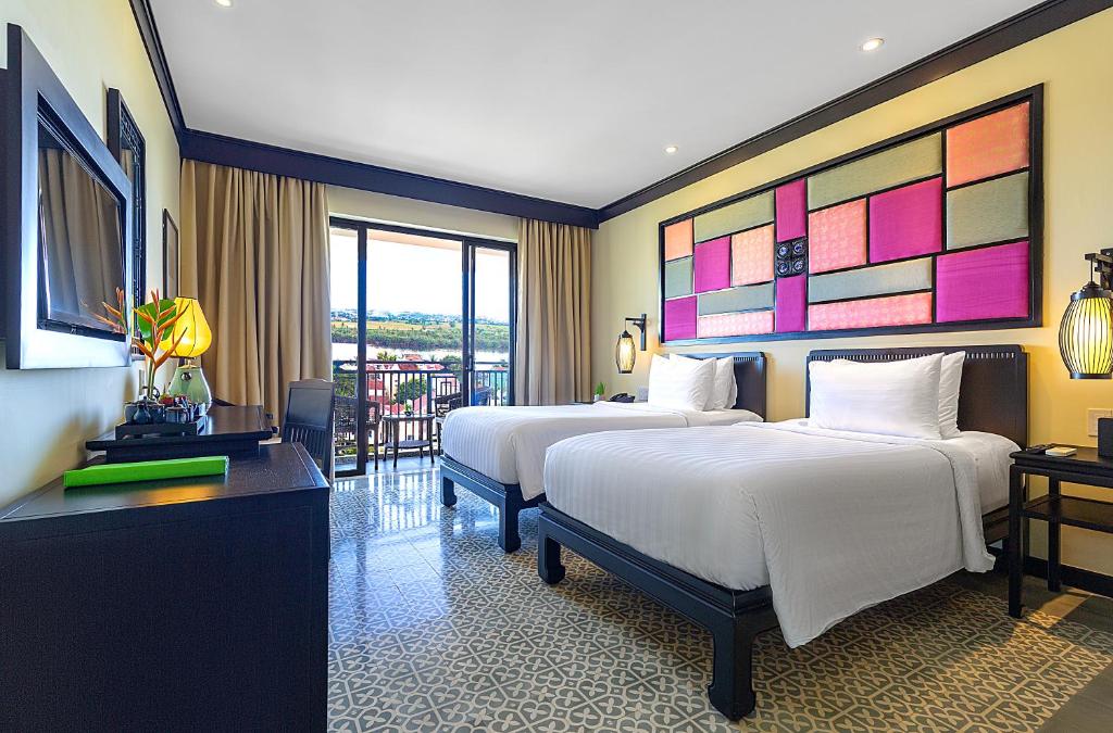 Phòng Deluxe 2 Giường Đơn Nhìn Ra Đại Dương/Ven Sông Và Có Ban Công