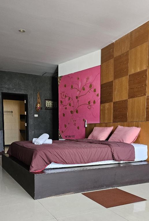 Postel nebo postele na pokoji v ubytování Velanon Phuket