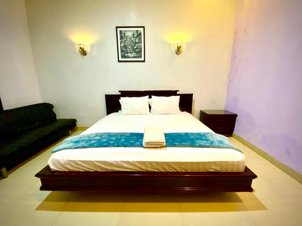 Postel nebo postele na pokoji v ubytování Serafinna Guest House