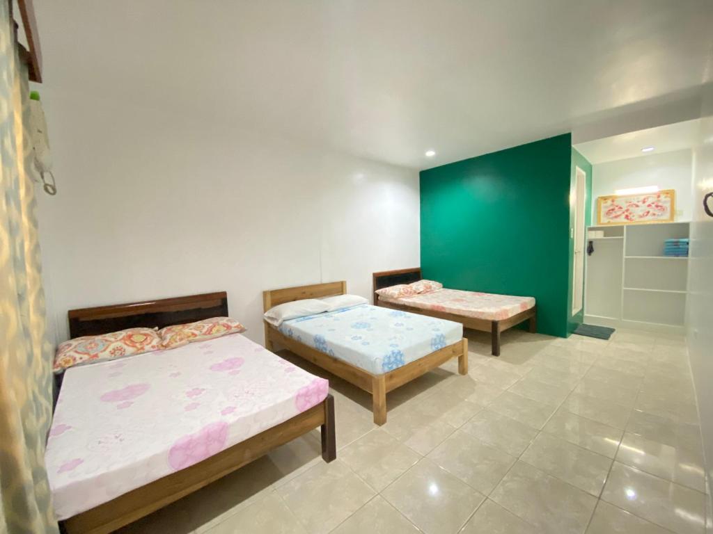 Postel nebo postele na pokoji v ubytování Seashore Inn