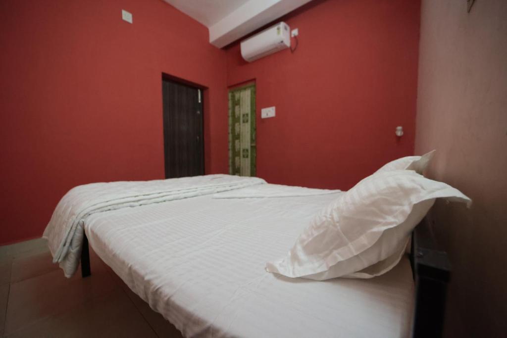 Postel nebo postele na pokoji v ubytování Al Huda