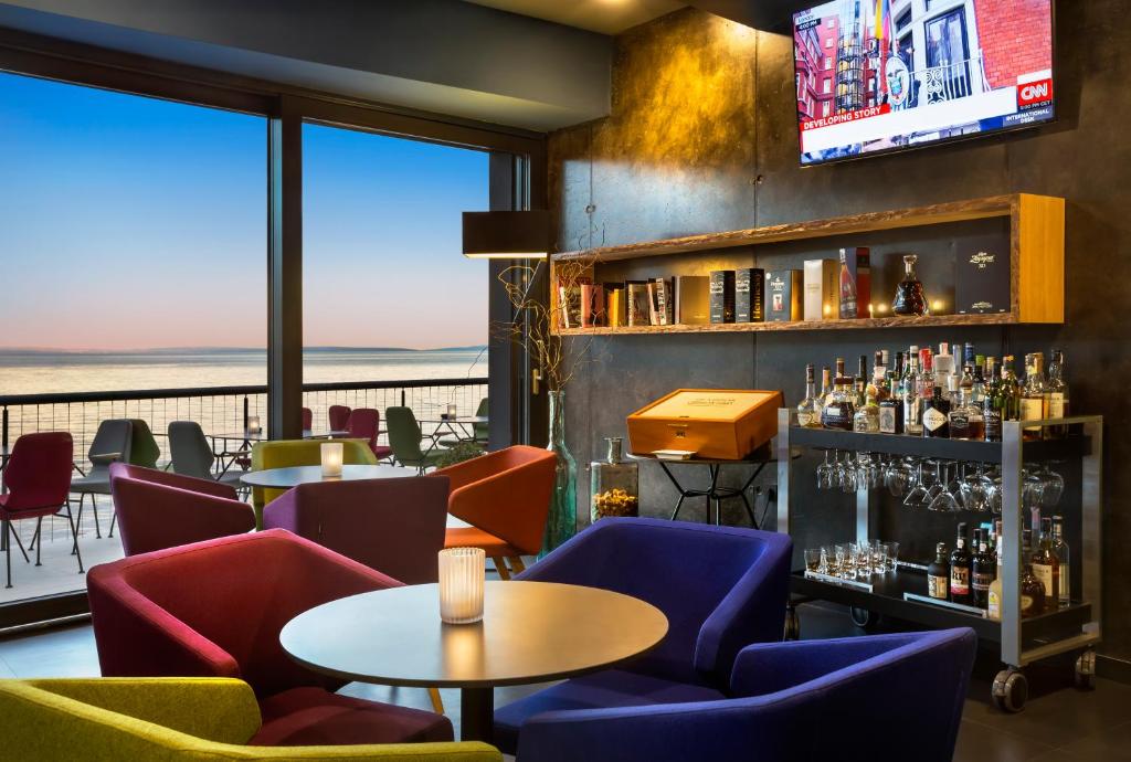 Μια τηλεόραση ή/και κέντρο ψυχαγωγίας στο Boutique & Design Hotel Navis - Small Luxury Hotels of the World