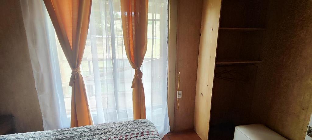 Voodi või voodid majutusasutuse Lodge Hare Ariki Koreto toas