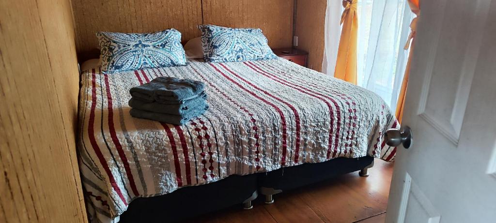 Voodi või voodid majutusasutuse Lodge Hare Ariki Koreto toas