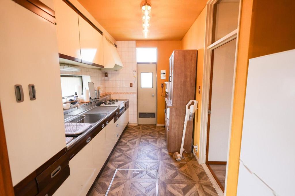 Kuchyň nebo kuchyňský kout v ubytování Sakuradai House