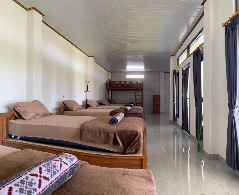 Postel nebo postele na pokoji v ubytování Darren Hostel