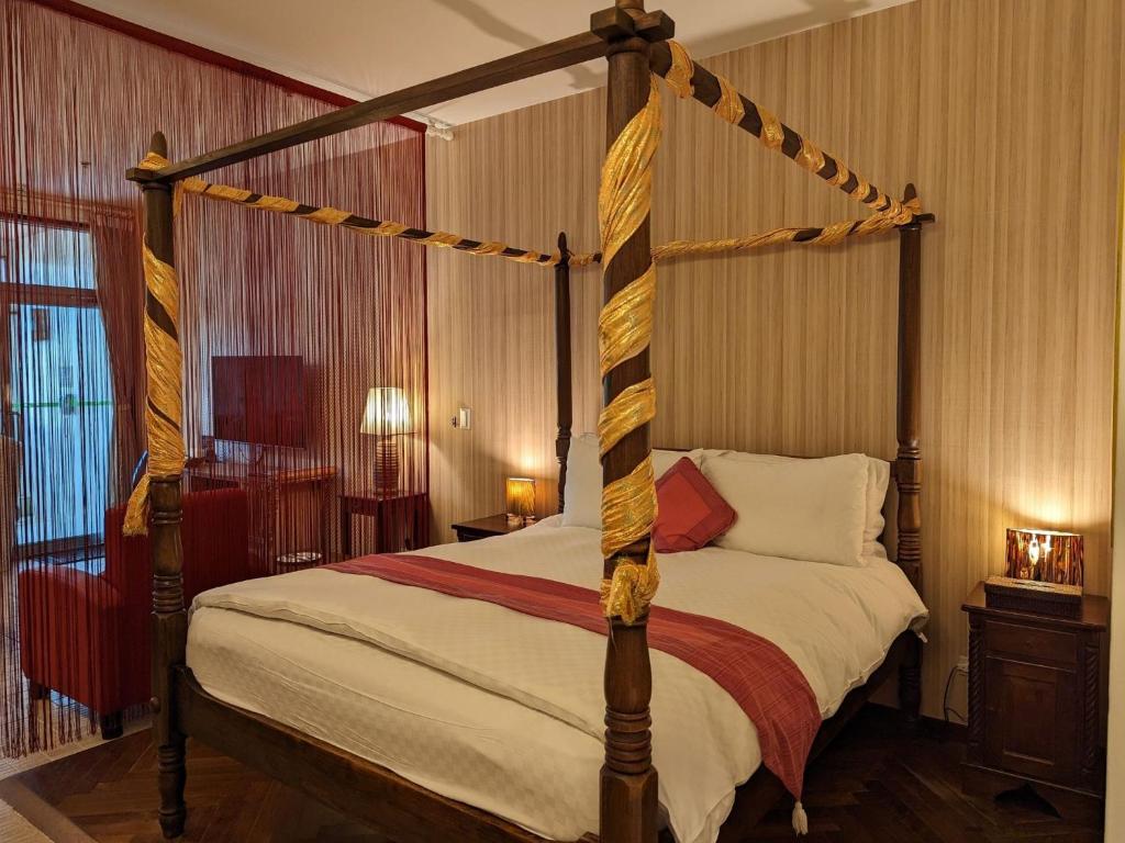 Ένα ή περισσότερα κρεβάτια σε δωμάτιο στο Howard Villa