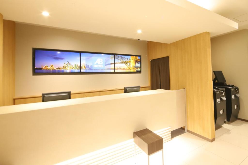 TV a/nebo společenská místnost v ubytování AB Hotel Nakatsugawa