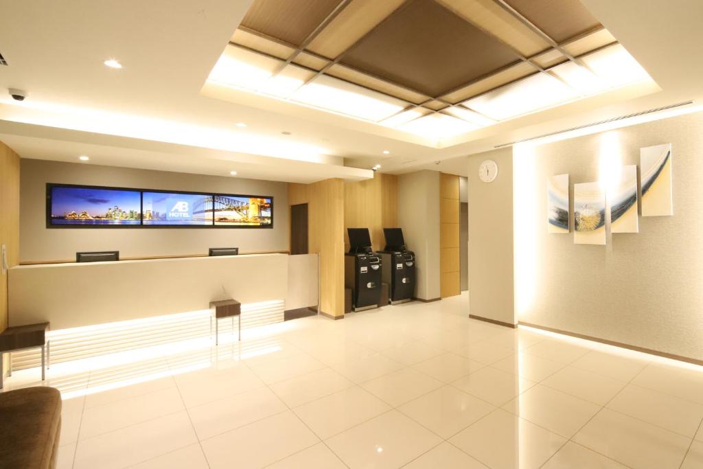 TV a/nebo společenská místnost v ubytování AB Hotel Nakatsugawa