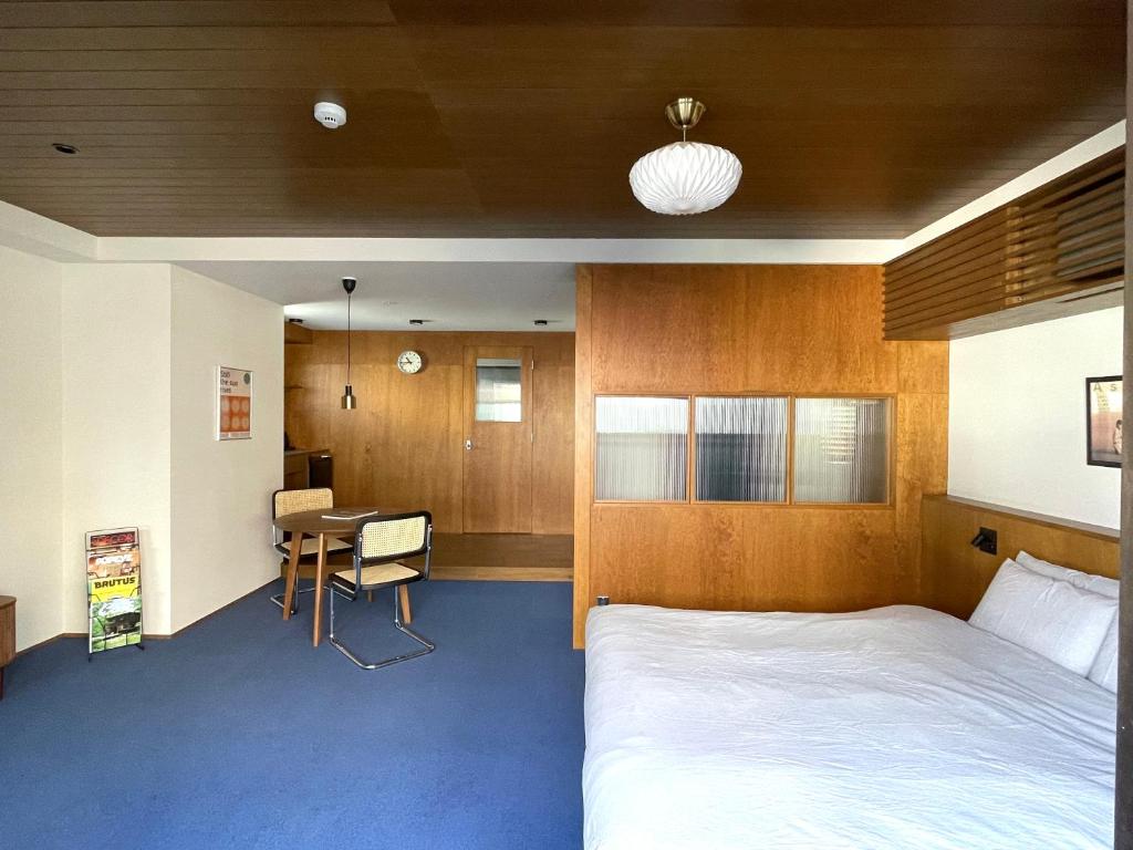 Postel nebo postele na pokoji v ubytování NO SERVICE HOTEL asakusa