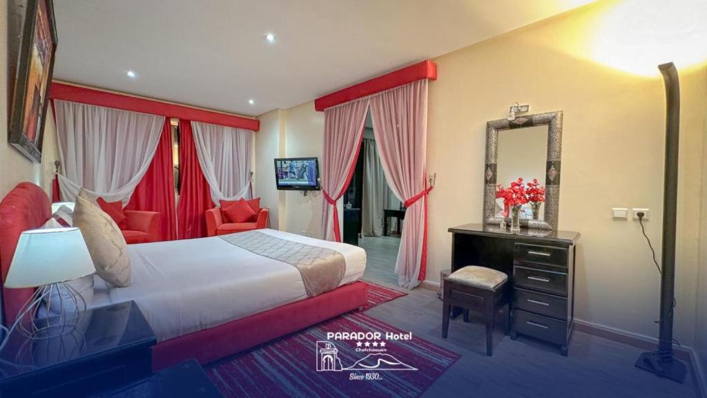 Postel nebo postele na pokoji v ubytování Hotel Parador