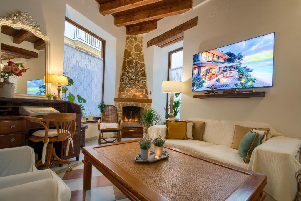 TV a/nebo společenská místnost v ubytování Hotel Argantonio