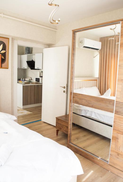 Postel nebo postele na pokoji v ubytování Two Bedroom King Suite TH30