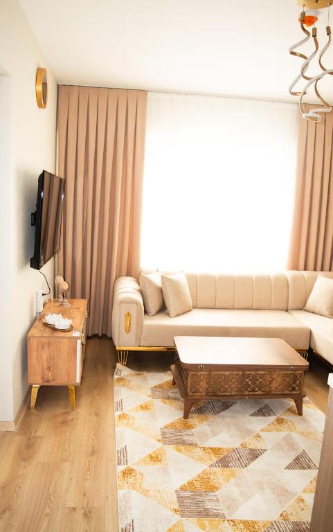 Posezení v ubytování Two Bedroom King Suite TH30