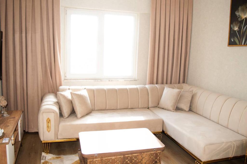 Posezení v ubytování Two Bedroom King Suite TH30
