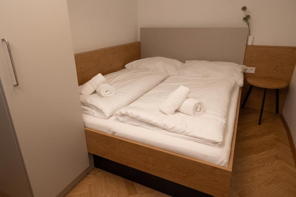 Postel nebo postele na pokoji v ubytování City Apartment Färbergasse Graz