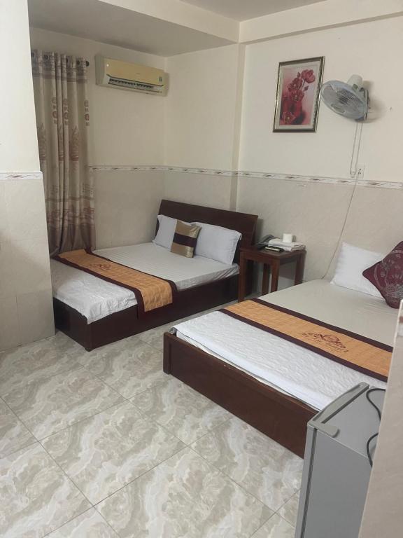 Postel nebo postele na pokoji v ubytování Đức Anh HoTel 2