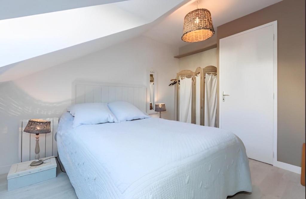 Postel nebo postele na pokoji v ubytování Appartement Newport vue mer