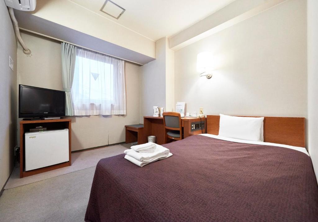 TV a/nebo společenská místnost v ubytování Select Inn Yaizu Ekimae